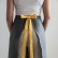 Adjustable width linen half apron with double pocket
