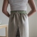 Adjustable width linen half apron with double pocket