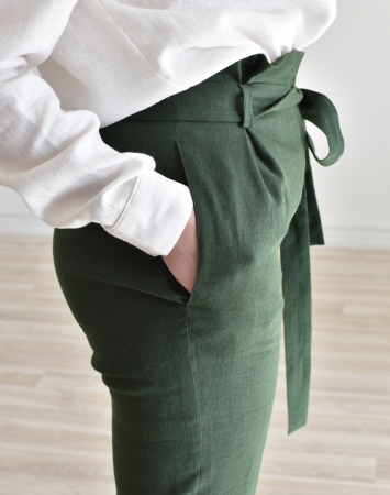 Dark green fitted linen pants with paper bag waist