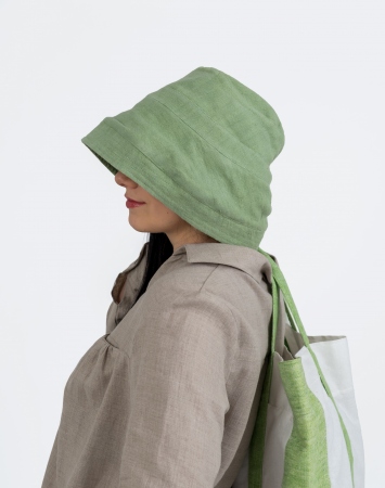 Green bucket hat with stitching