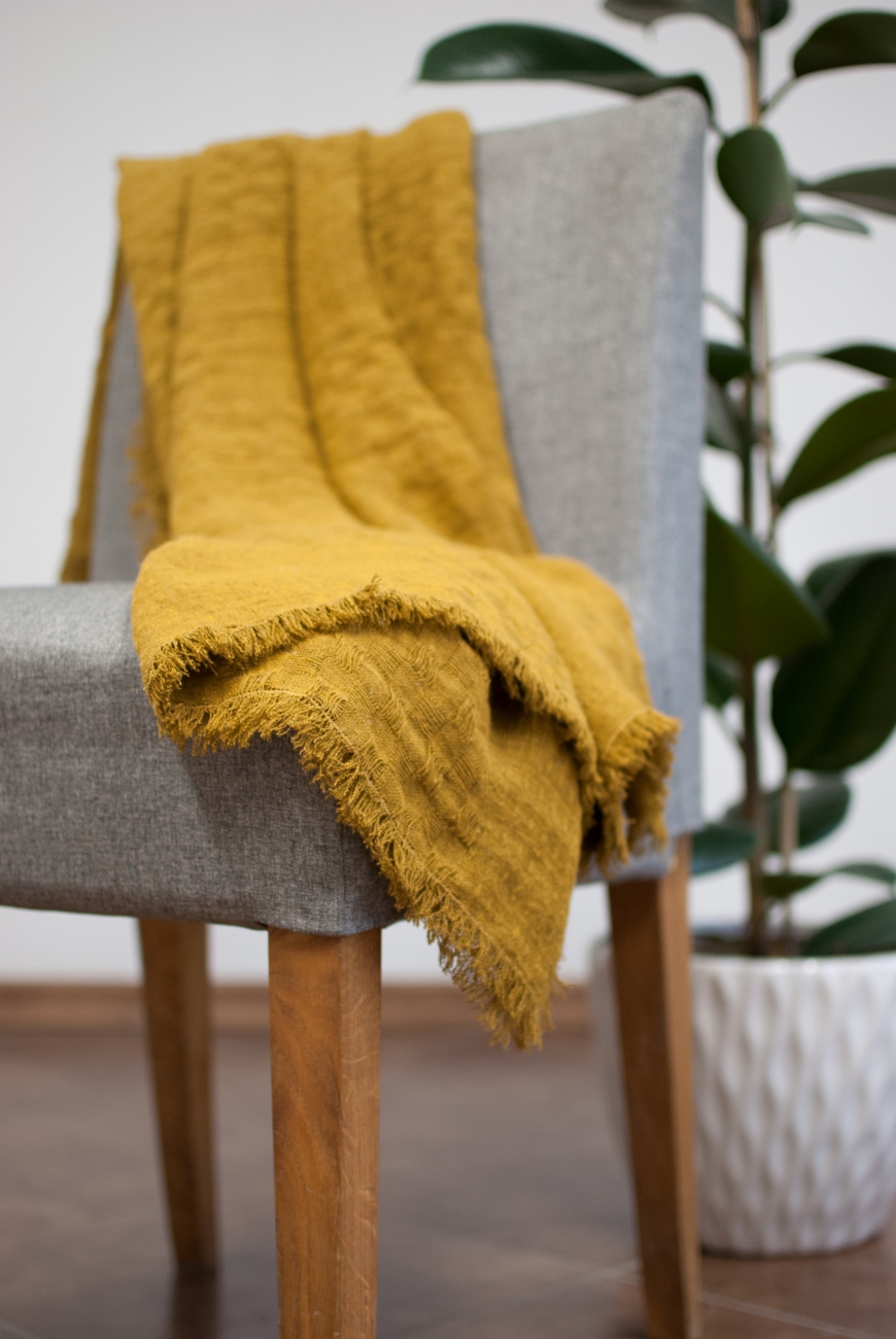 Mustard linen throw blanket with frayed ends