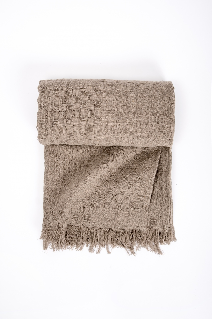 Natural linen throw blanket with frayed ends