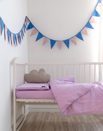 Pink three-piece baby bedding set