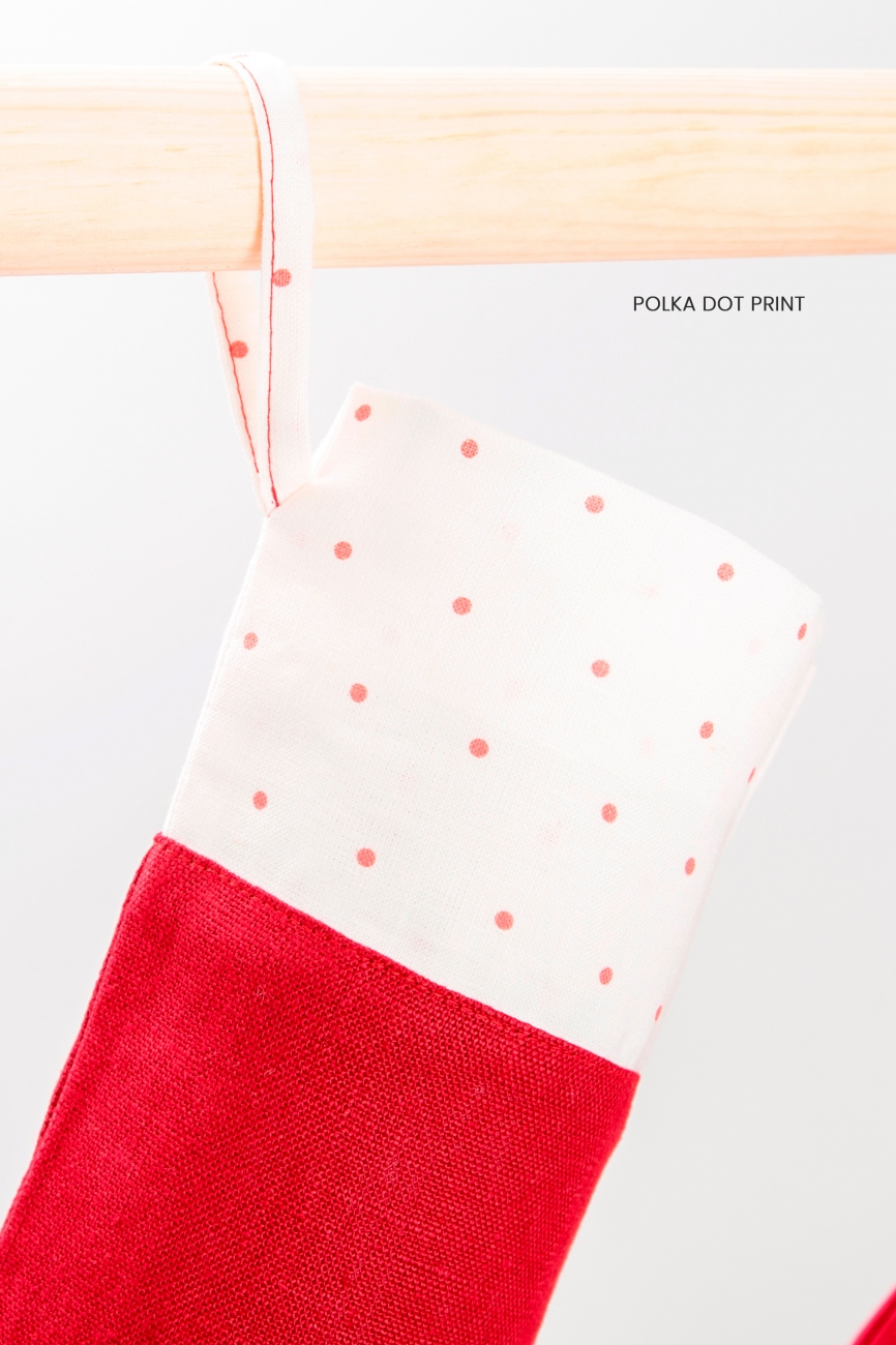 Red Christmas stocking with printed cuff