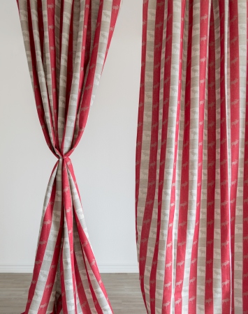 Red tab top curtain panel with moose pattern