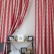 Red tab top curtain panel with moose pattern
