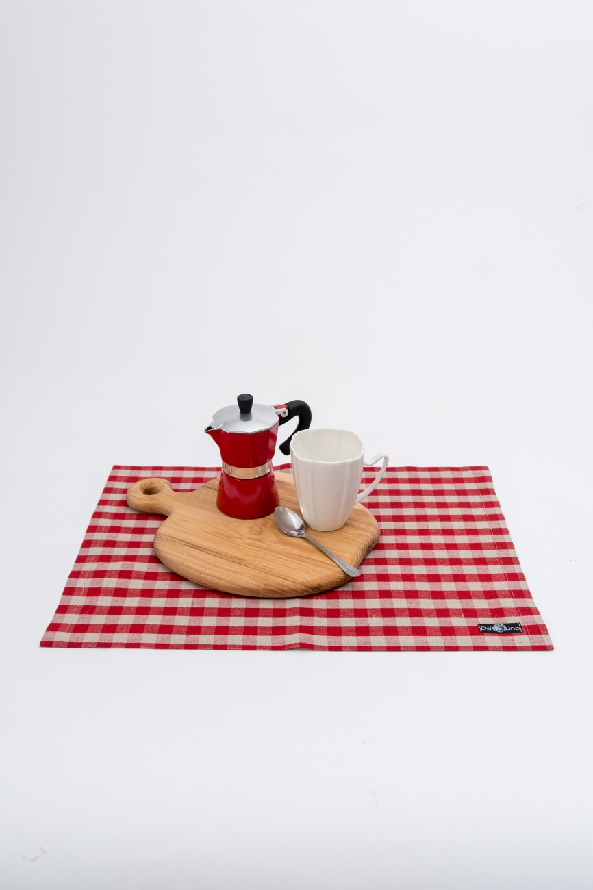 Set of red linen table placemats with ckecks