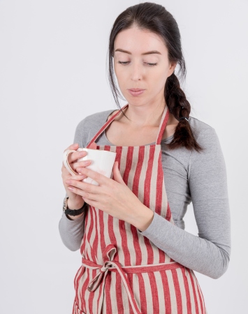 Striped linen bib apron with a double pocket