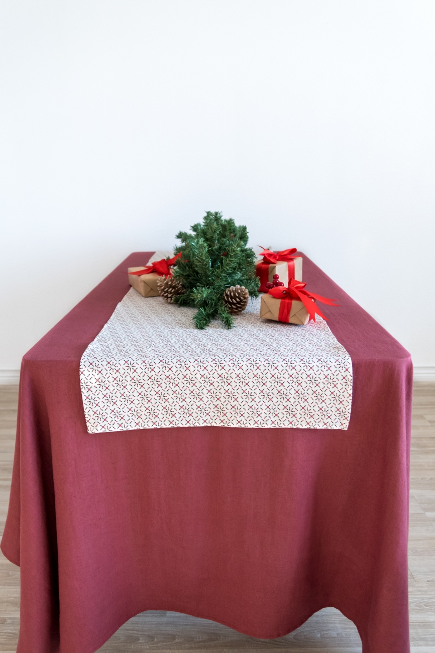 White linen Christmas table runner with red print